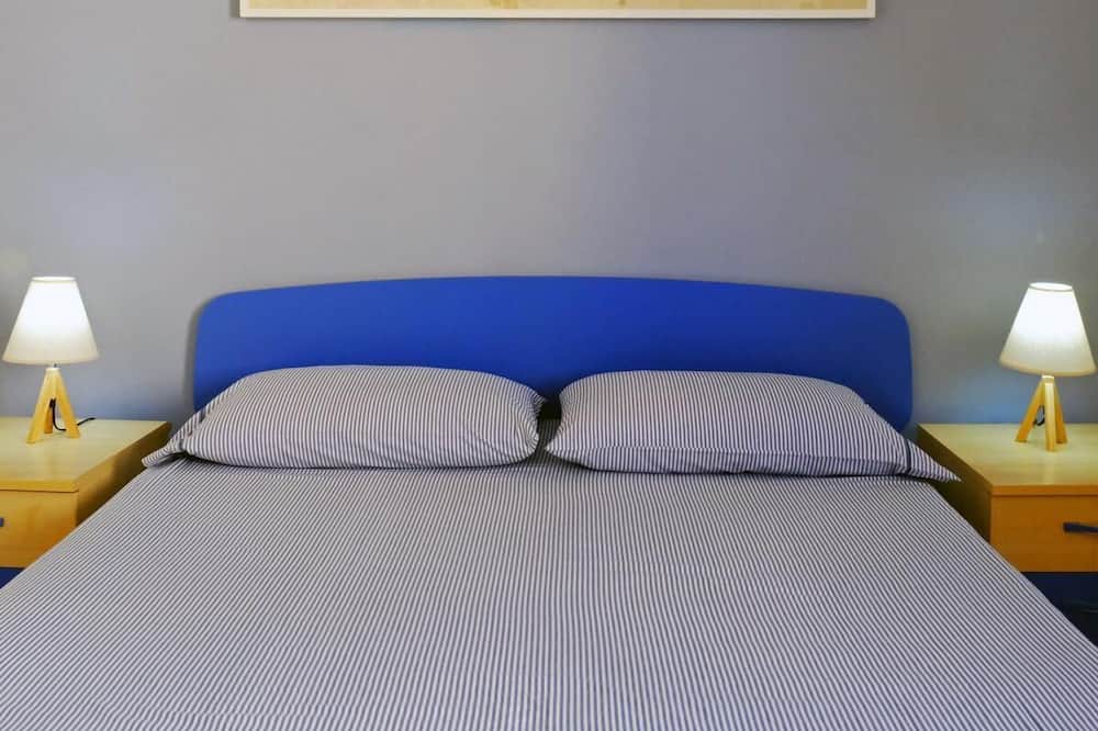 Photo of Bedroom in Punta Braccetto