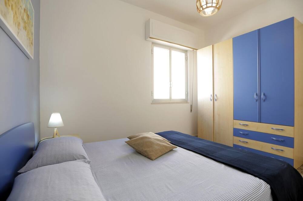 Photo of Bedroom in Punta Braccetto