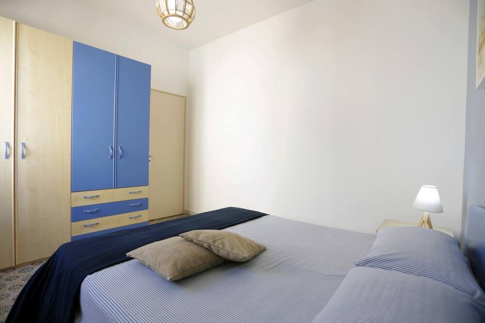 Photo of Bedroom in Punta Braccetto