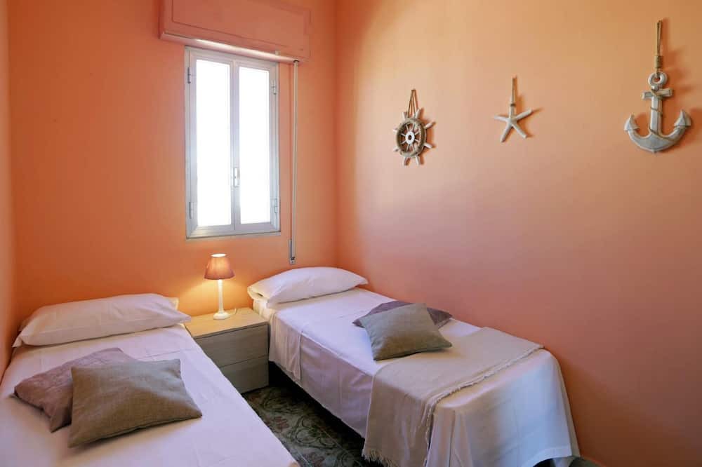 Photo of Bedroom in Punta Braccetto
