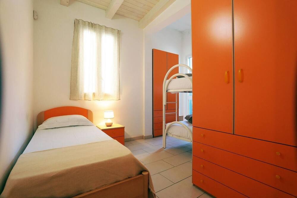 Photo of Bedroom in Punta Braccetto