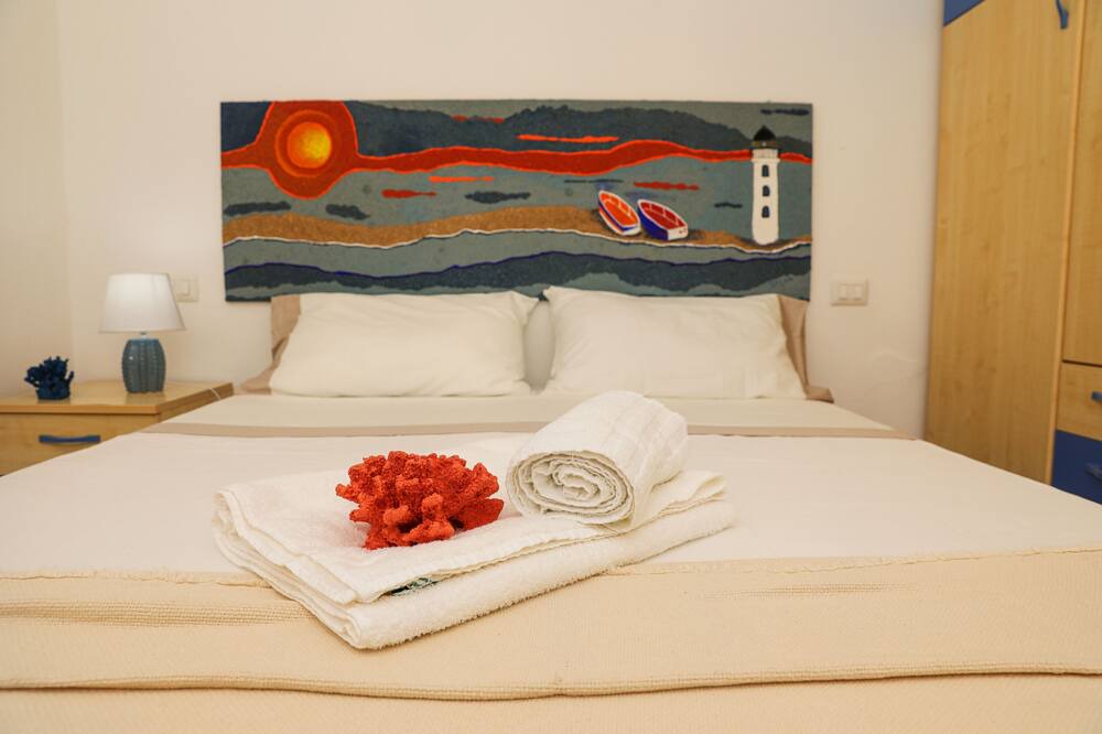 Photo of Bedroom in Punta Braccetto