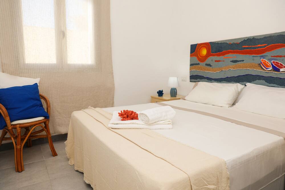 Photo of Bedroom in Punta Braccetto