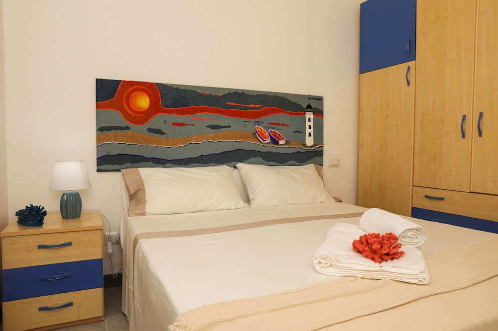 Photo of Bedroom in Punta Braccetto