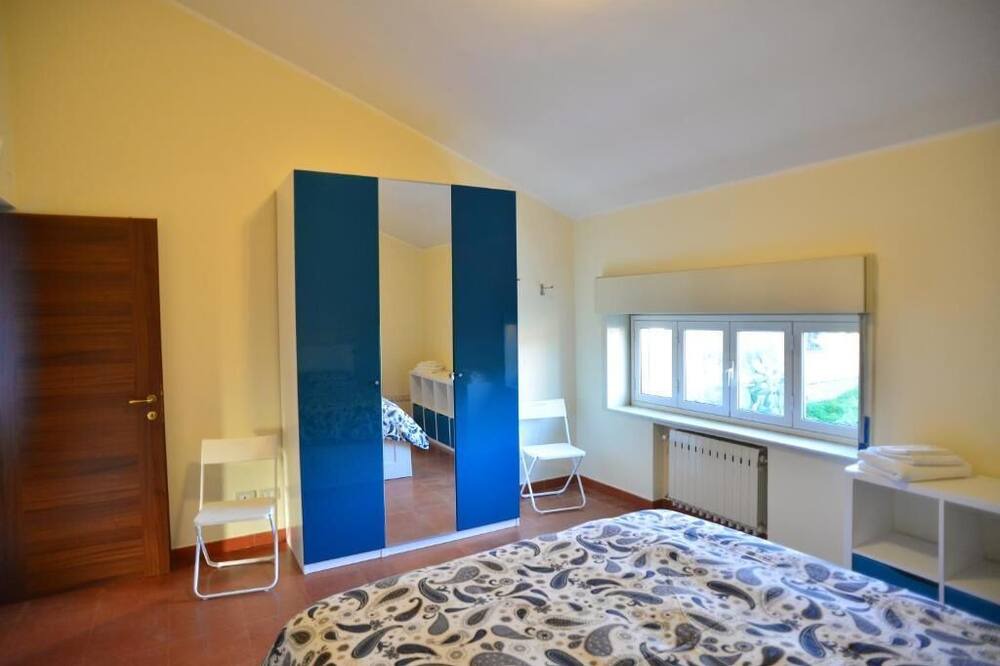 Photo of Bedroom in Villaggio del Pino-Le Ginestre