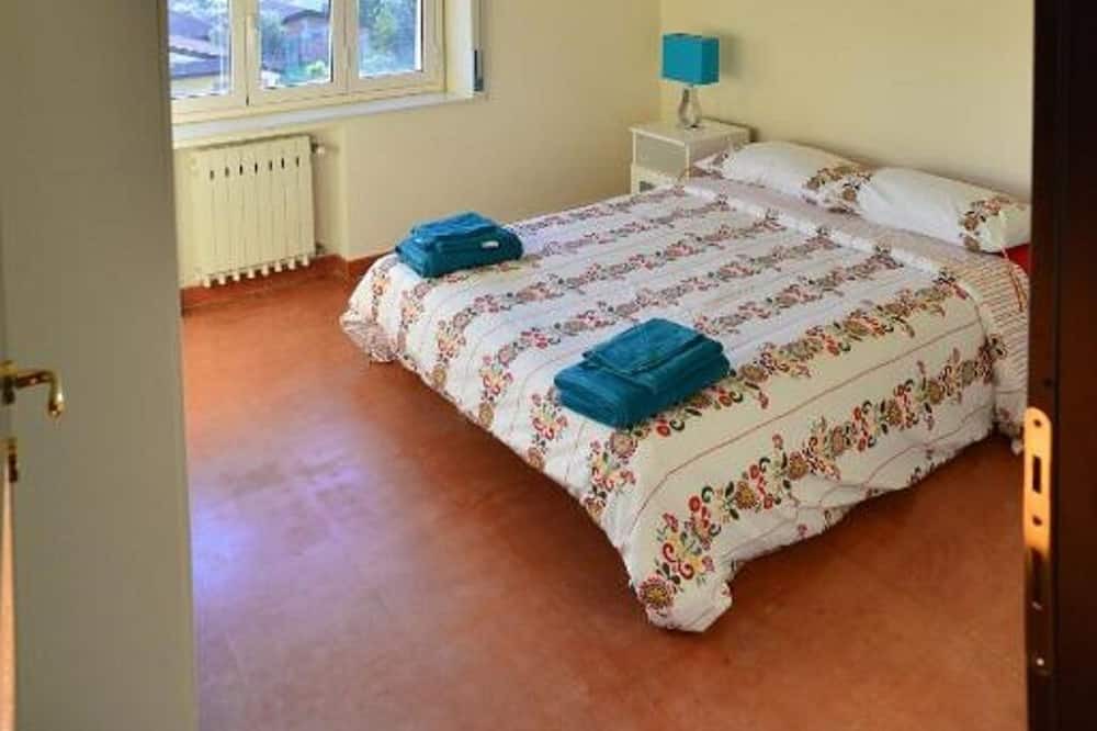 Photo of Bedroom in Villaggio del Pino-Le Ginestre