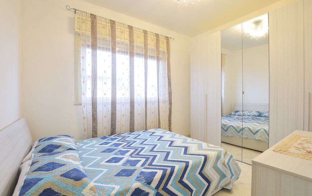Photo of Bedroom in Punta Braccetto