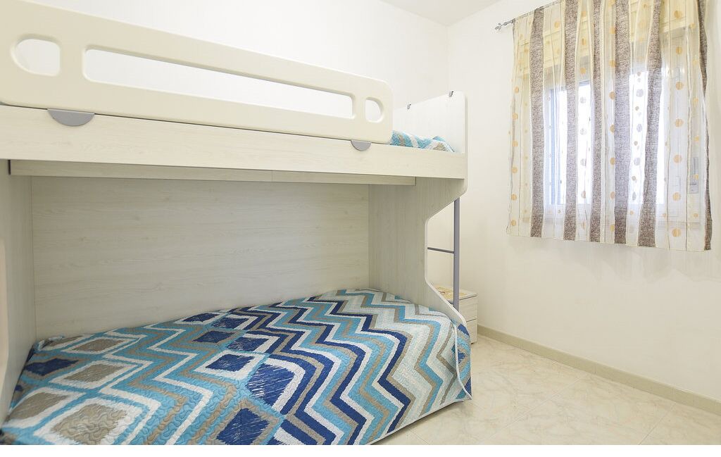 Photo of Bedroom in Punta Braccetto