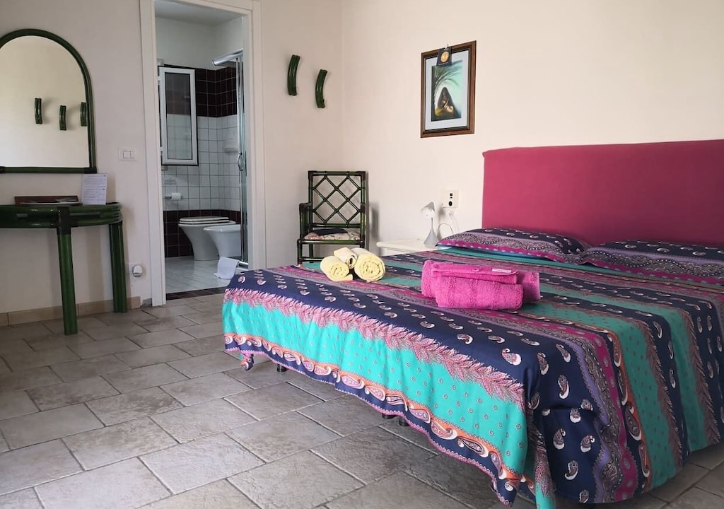 Photo of Bedroom in Punta Braccetto