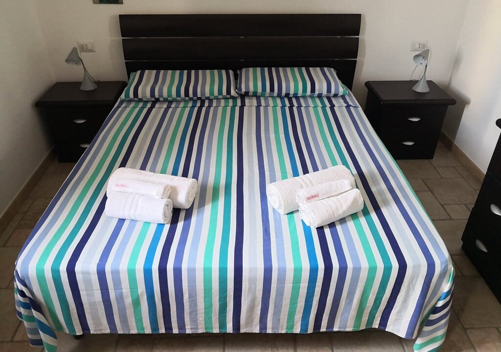 Photo of Bedroom in Punta Braccetto