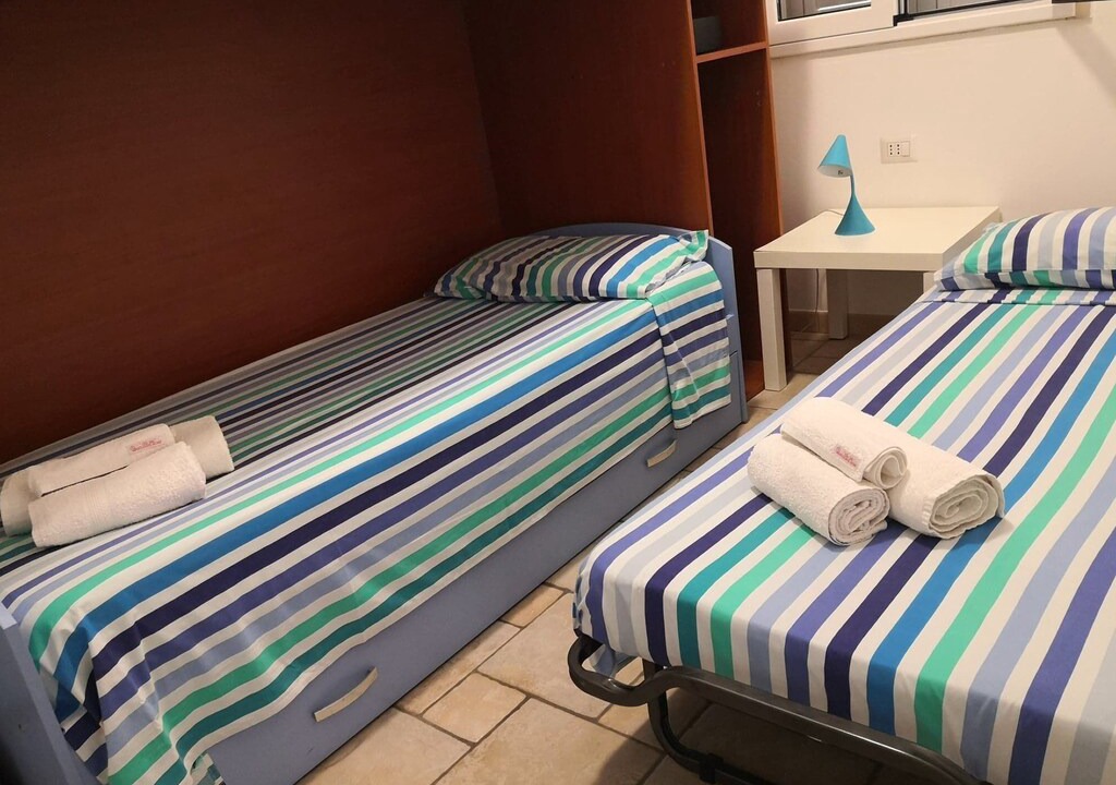 Photo of Bedroom in Punta Braccetto