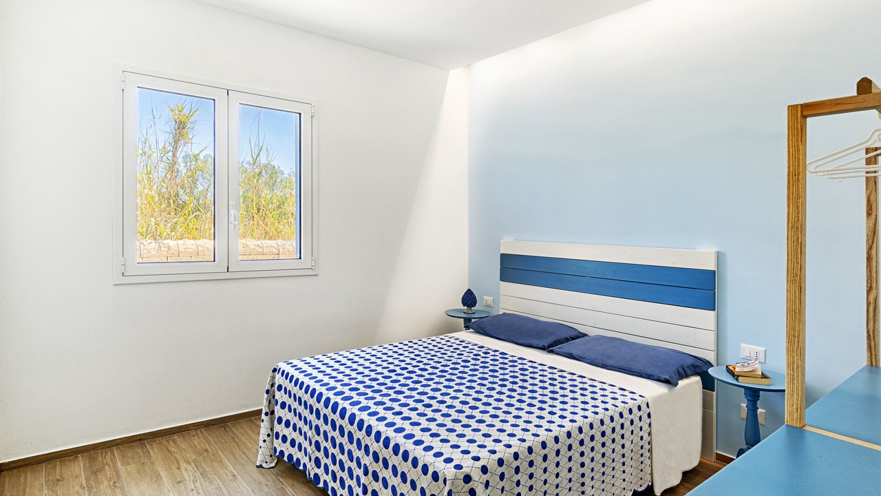 Photo of Bedroom in Punta Braccetto