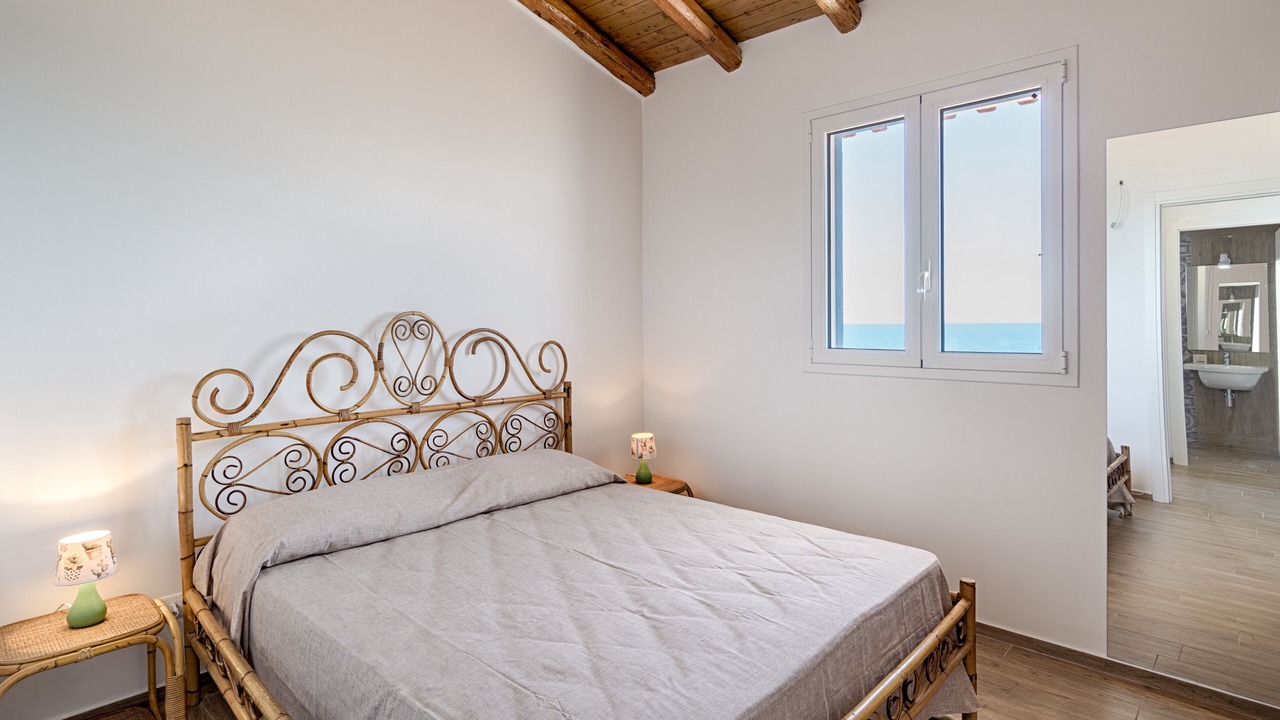 Photo of Bedroom in Punta Braccetto