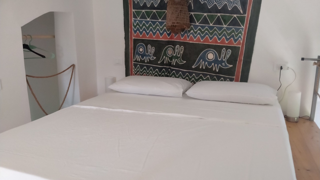 Photo of Bedroom in Torre Colonna-sperone
