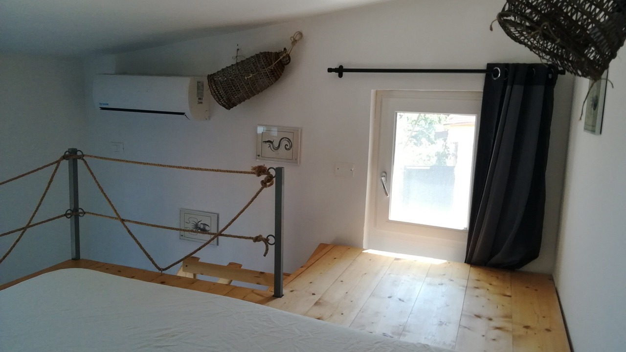 Photo of Bedroom in Torre Colonna-sperone