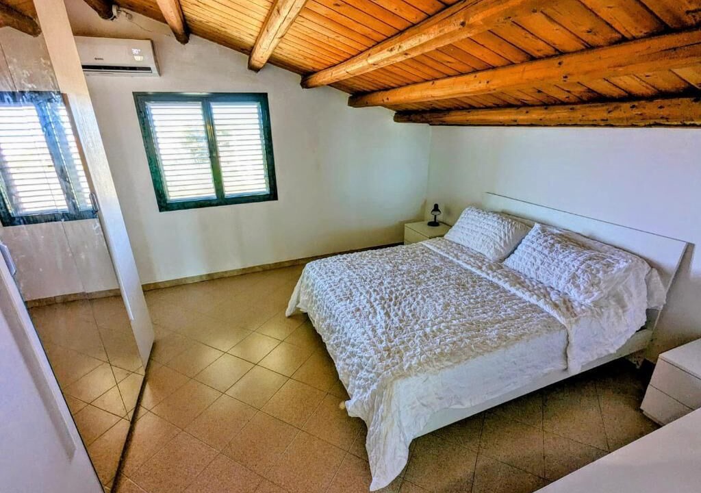 Photo of Bedroom in Punta Braccetto