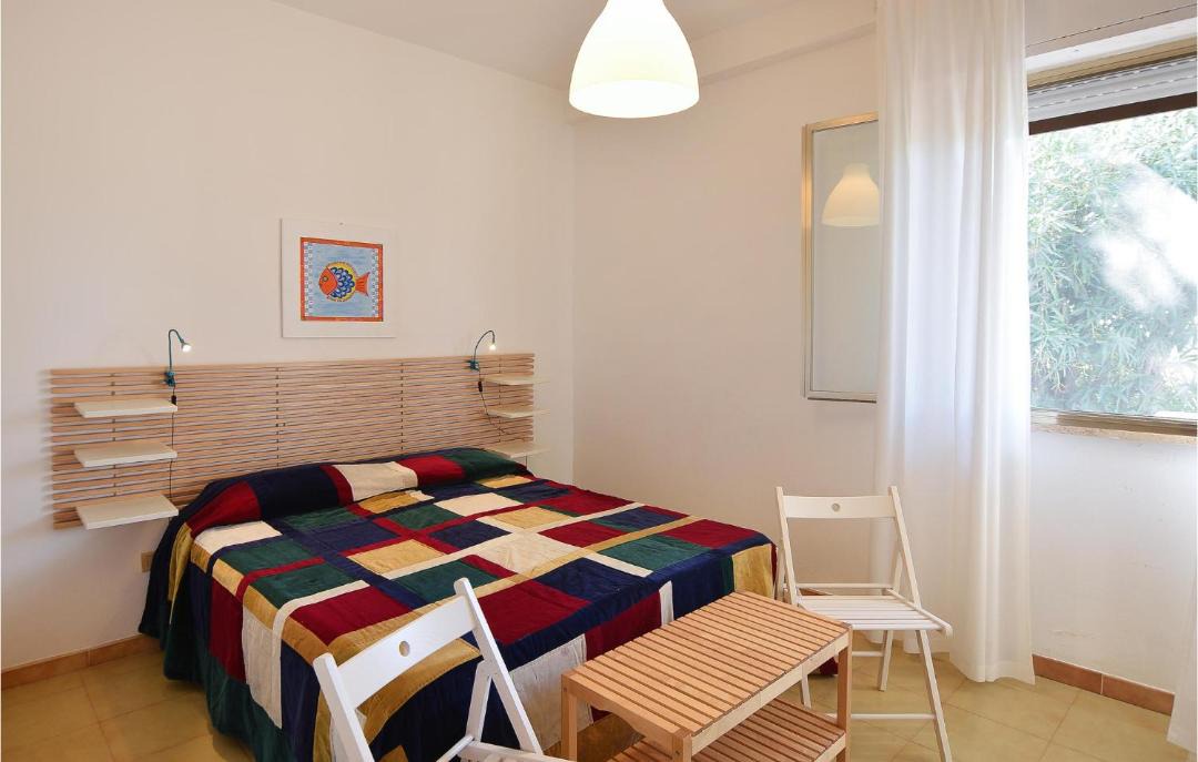 Photo of Bedroom in Punta Braccetto