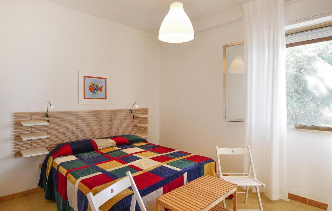 Photo of Bedroom in Punta Braccetto