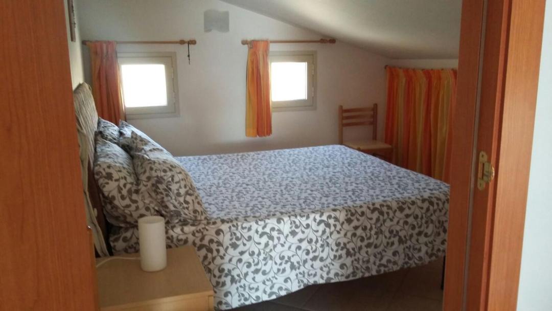 Photo of Bedroom in Punta Braccetto