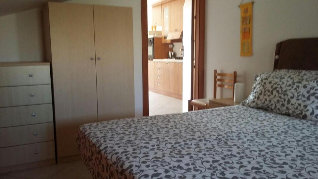 Photo of Bedroom in Punta Braccetto