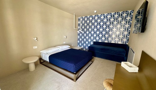 Junior Triple Room, Partial Sea View