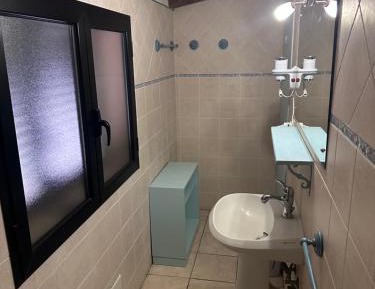 Quadruple Room with Private Bathroom