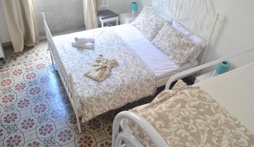 Quadruple Room with Shared Bathroom