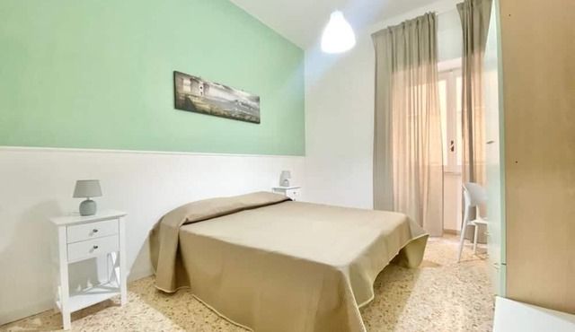 Centrally located rooming house, two minutes from the station and tourist pier.
